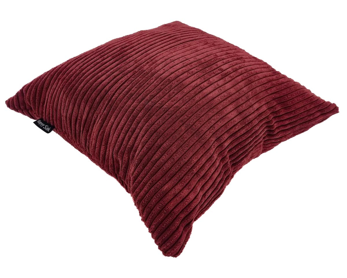Red textured pillow on a white background