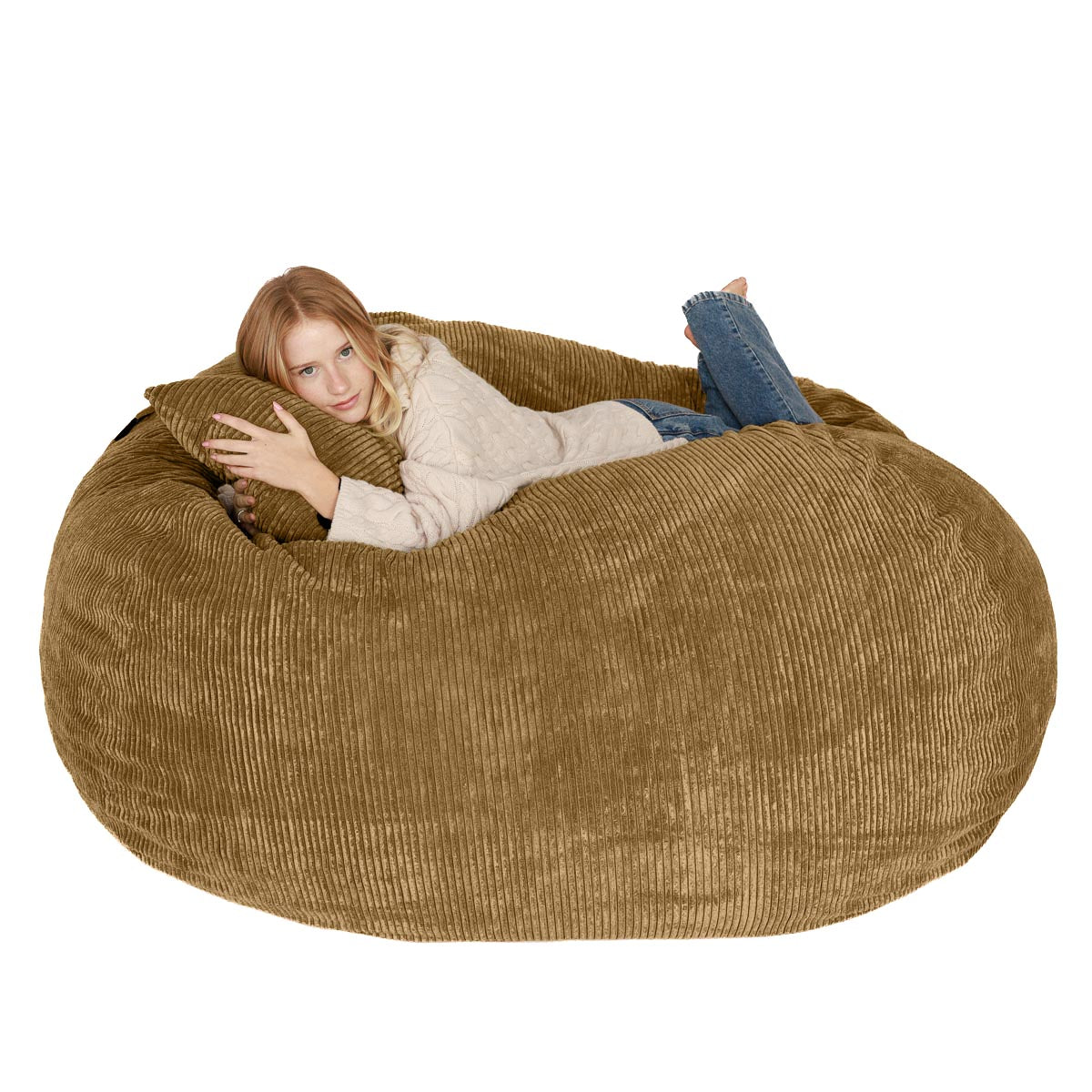 Woman lying inside a large brown bean bag chair on a white background