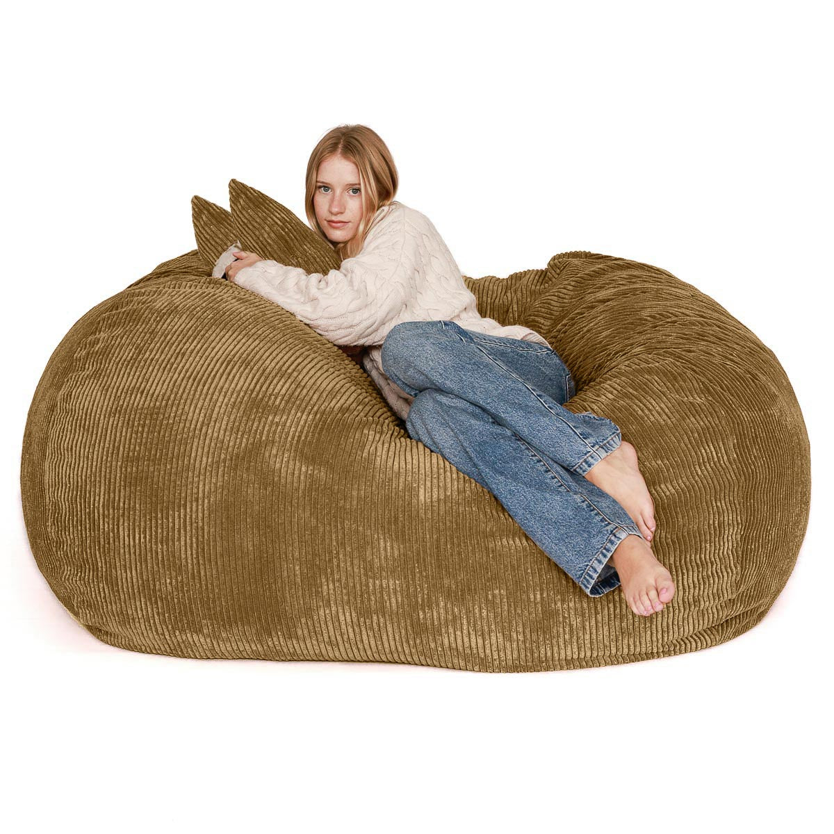 Woman sitting on a large brown bean bag chair against a white background