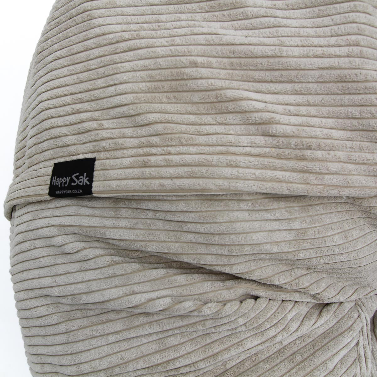 Beige textured bag with a visible brand label on a white background