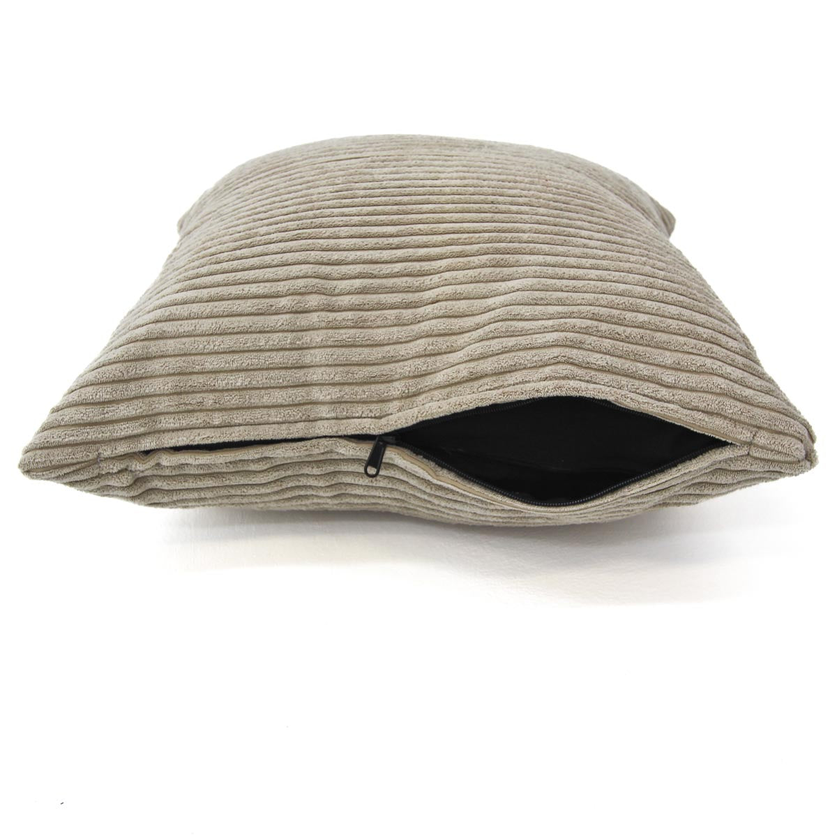 Textured beige pillow on a white background