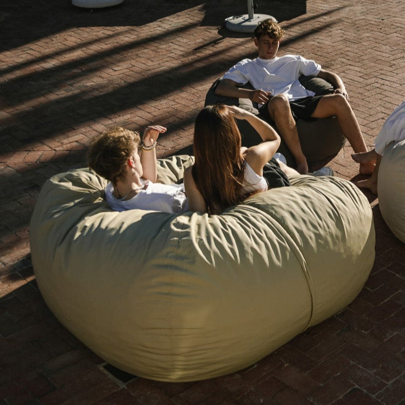 Couple sitting on Bean Bag