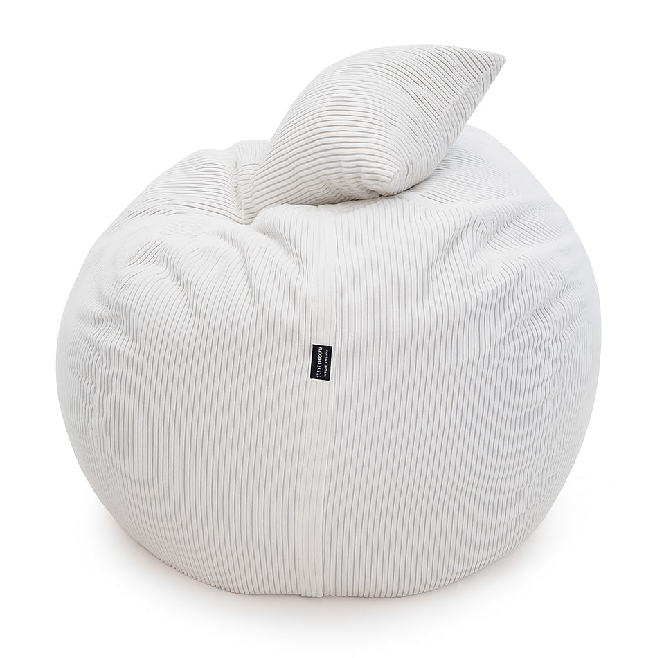 White bean bag chair with a pillow on a white background