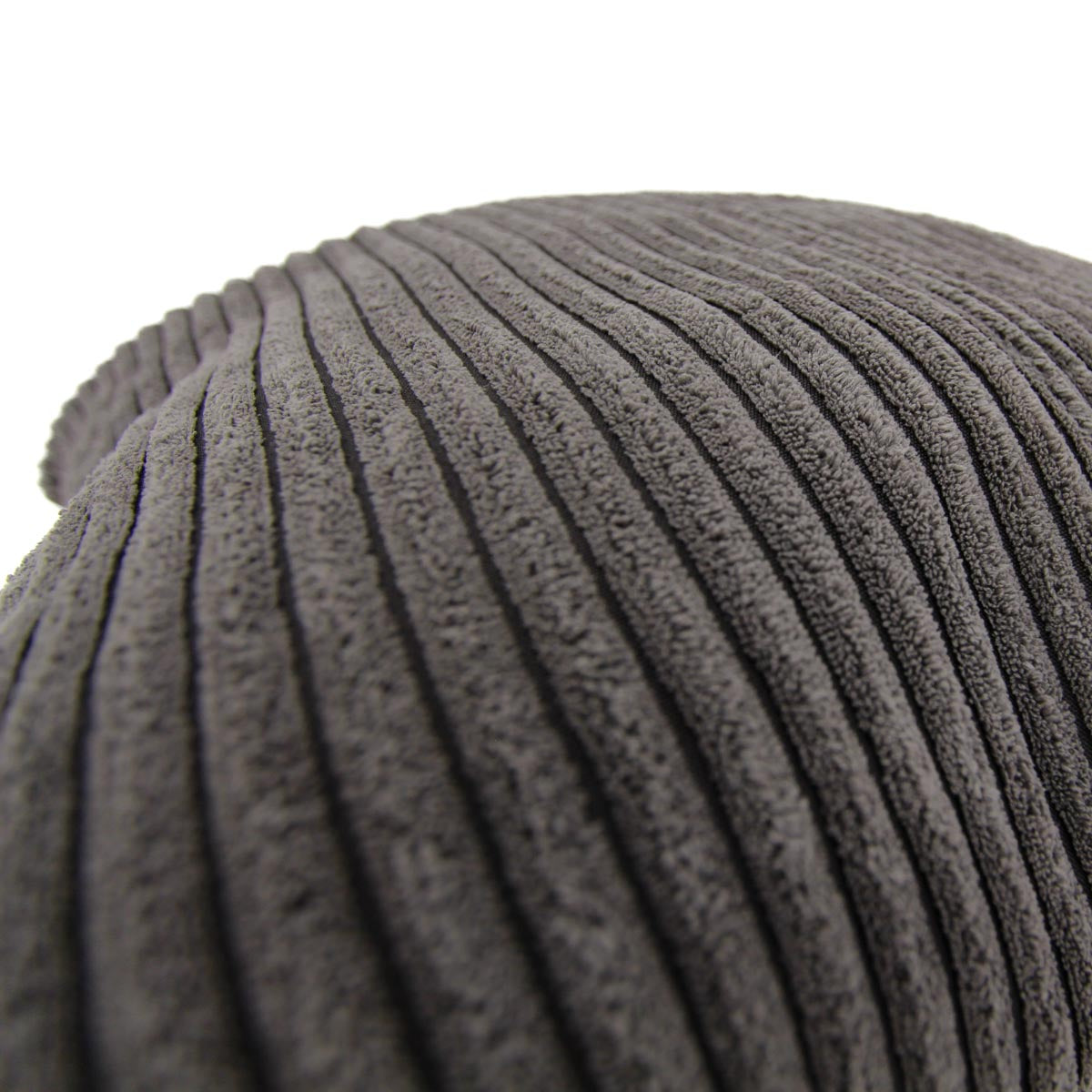Close-up of a textured gray cushion on a white background