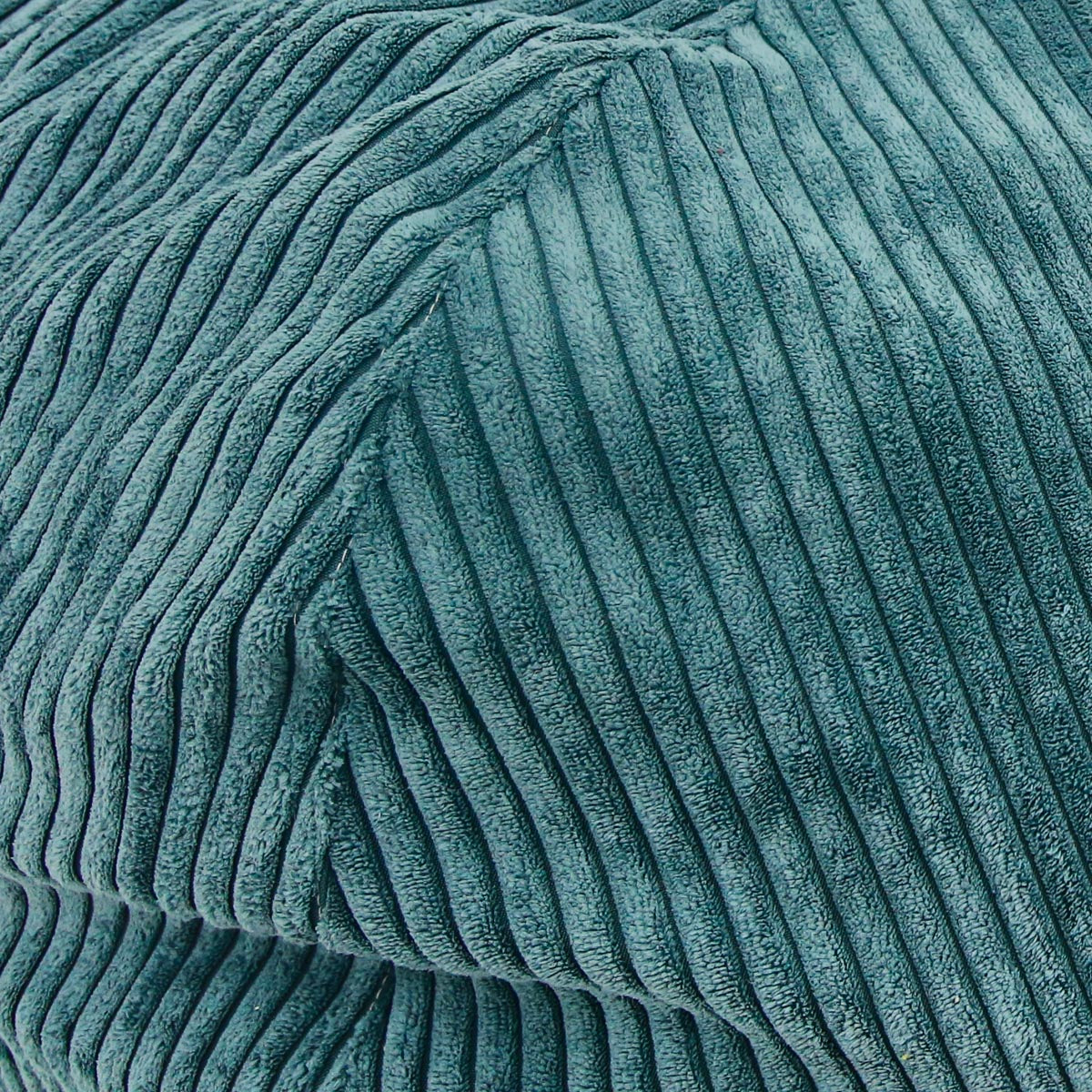Close up of teal corduroy fabric
