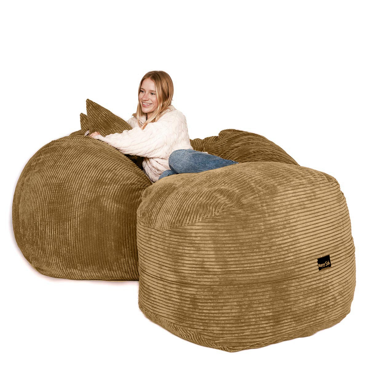 Woman sitting on a large brown bean bag chair with a white background