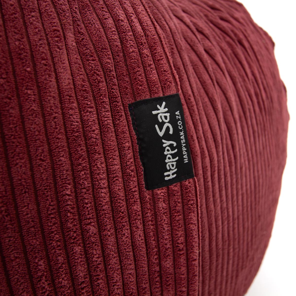 Maroon textured bag with 'Happy Sak' label on a white background