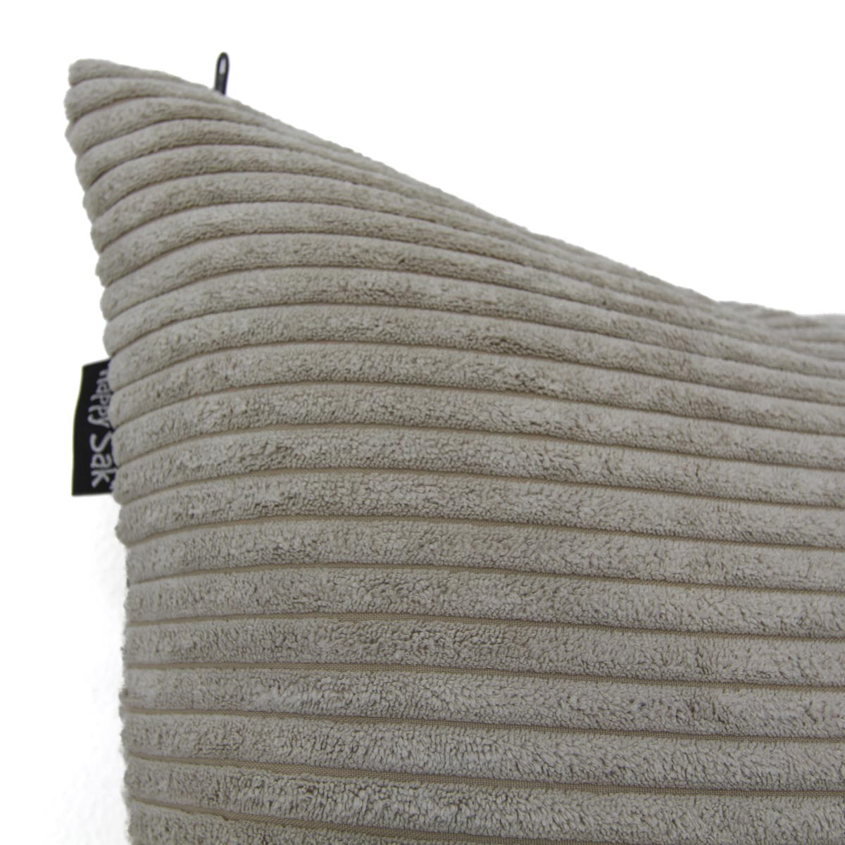 Textured pillow with ribbed pattern on a white background