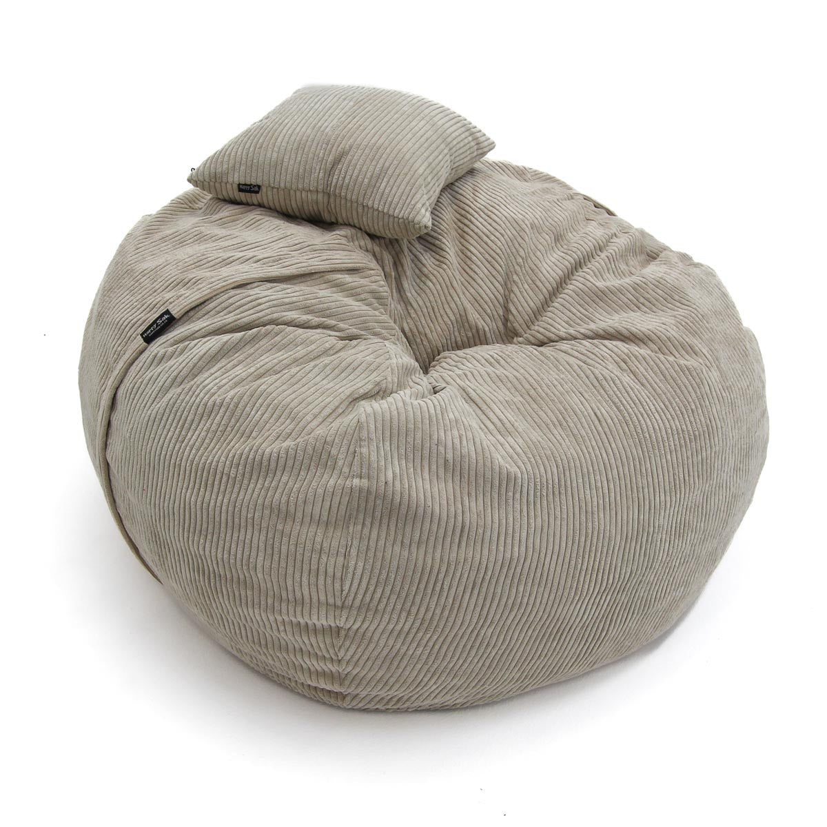 Beige bean bag chair with a pillow on a white background